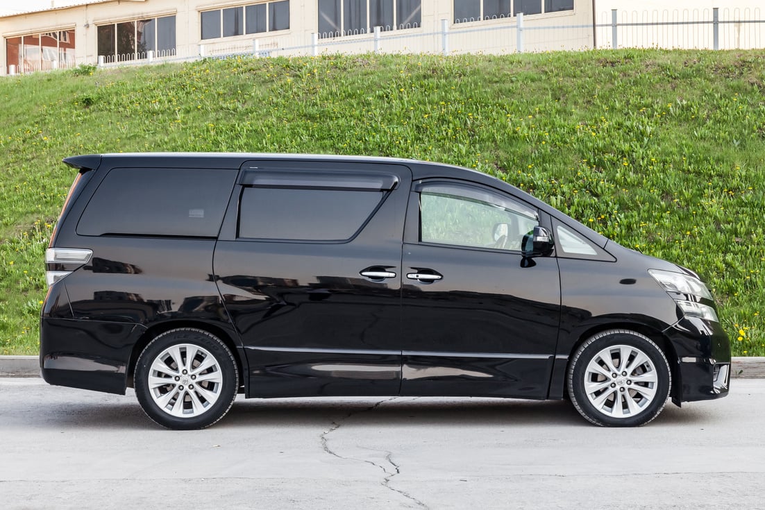 Side View of Toyota Vellfire Japanese Luxury Minivan Car in Blac